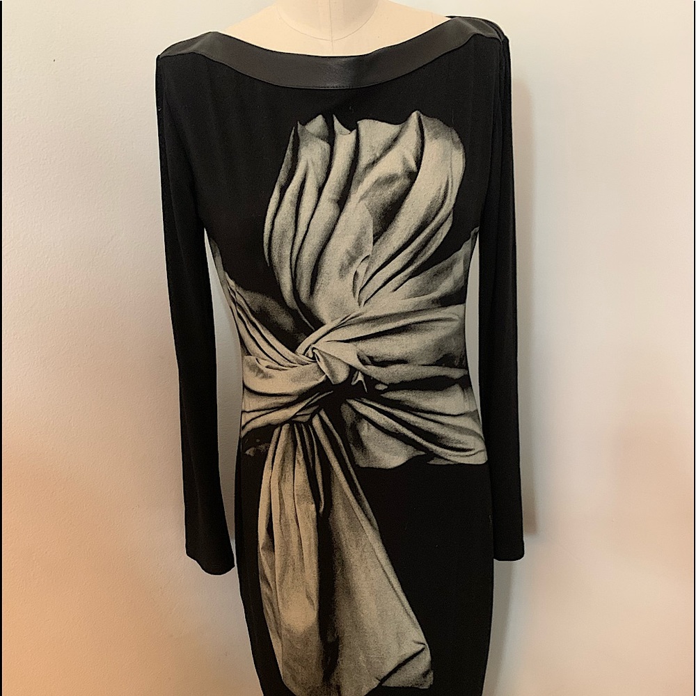 New, never worn leather trim neckline